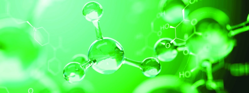 A transparent molecule floating on a background of green molecules and formulas.